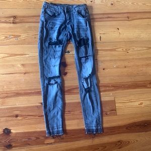 black jeans with holes